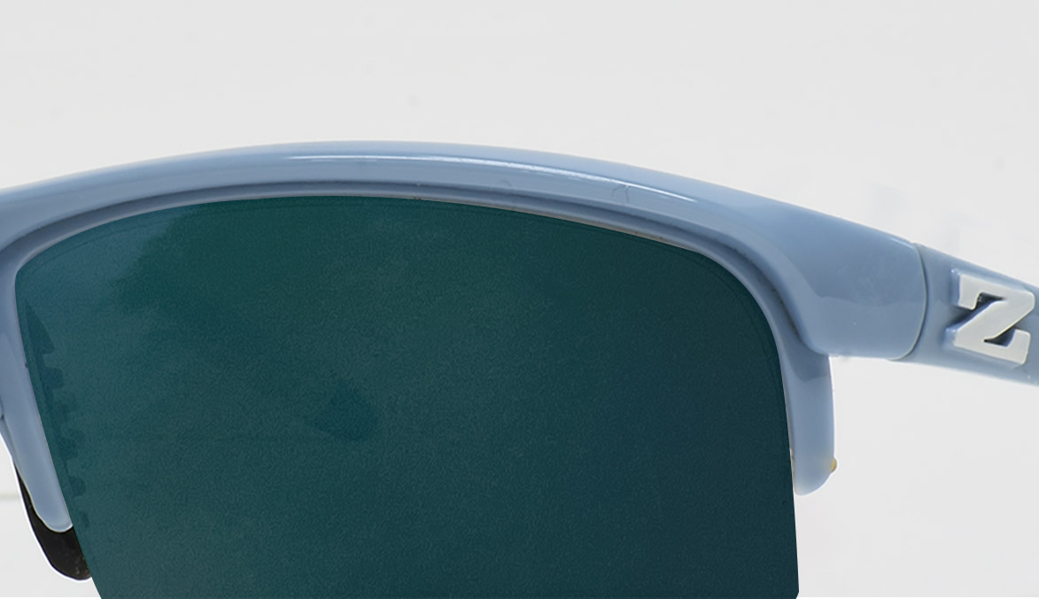 zoran-blue-frame-emerald-lens