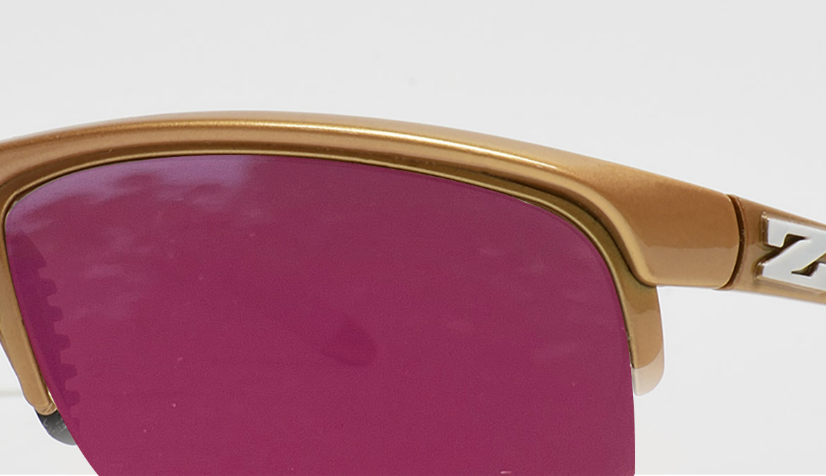zoran-gold-frame-ruby-red-lens