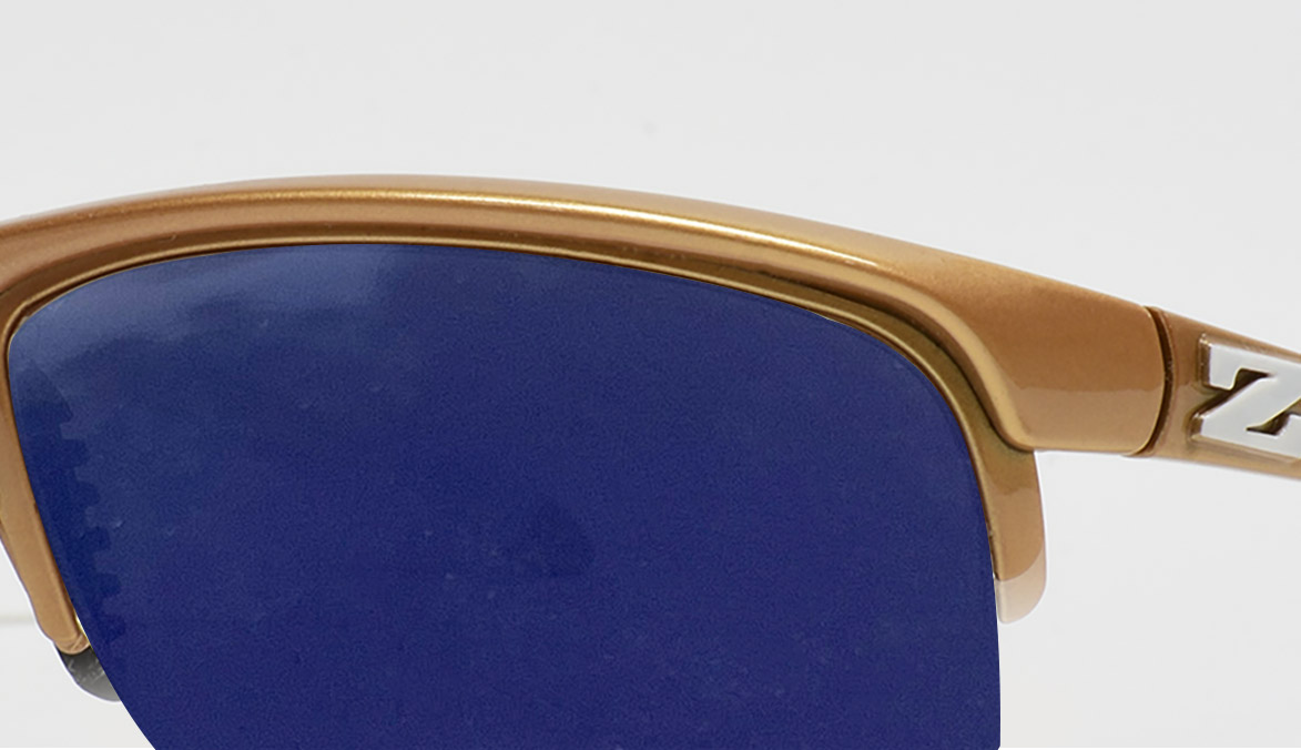 zoran-gold-frame-saphire-lens
