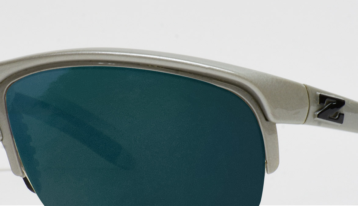 zoran-silver-frame-emerald-lens